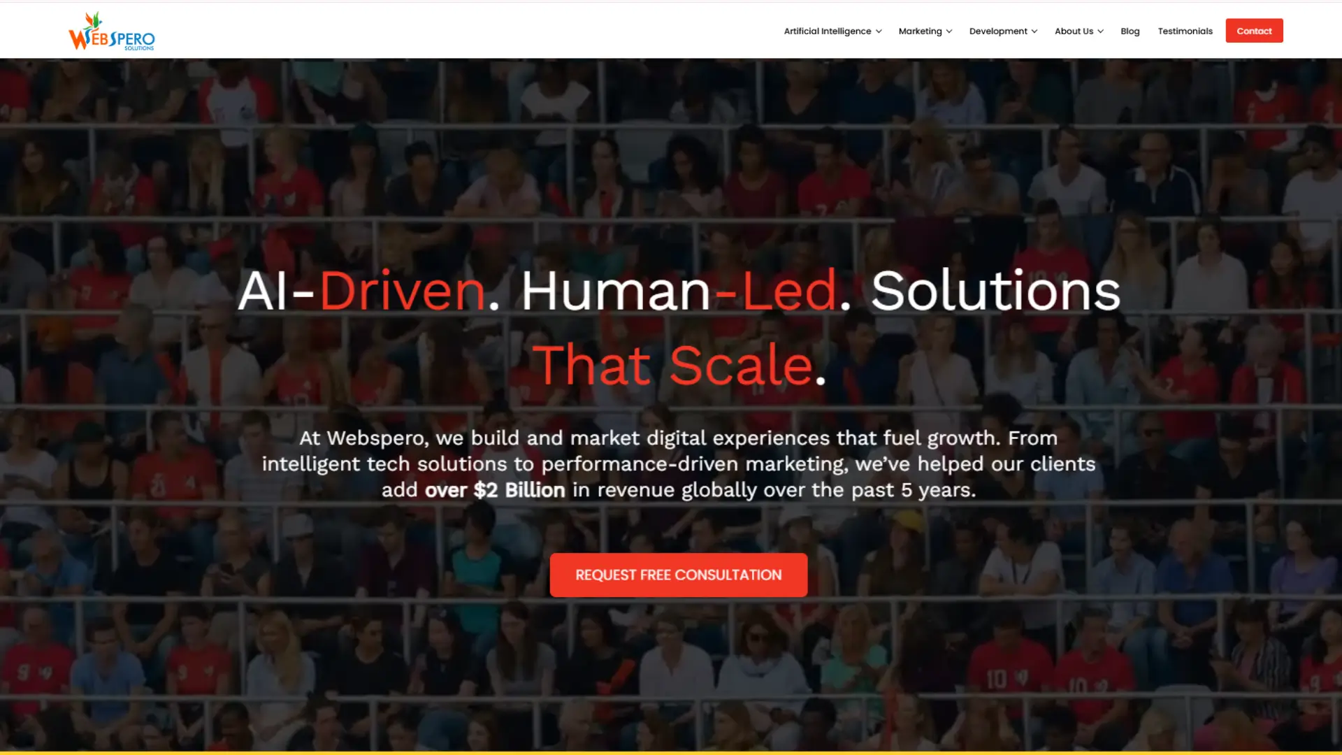 Webspero Solutions homepage banner with text ‘AI-Driven. Human-Led. Solutions That Scale’ over a crowd background.